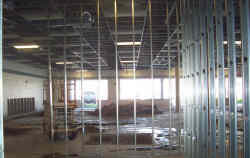 <h1>Steel Stud Walls and Drywall</h1>
<p>Steel stud walls paired with drywall are a popular choice for construction projects due to their durability and versatility. This combination provides a solid and reliable structure while also allowing for easy customization and finishing.</p>
<p>Steel studs are made of high-quality, galvanized steel, making them extremely strong and resistant to warping or bending. They are also lighter than traditional wood studs, making them easier to handle and transport. Additionally, steel studs are not susceptible to issues such as pests, rot, or fire, making them a safer and more durable option.</p>
<p>Drywall, also known as gypsum board or plasterboard, is a common material used for interior walls and ceilings. It consists of a core of gypsum sandwiched between layers of paper, creating a strong and smooth surface. Drywall is easy to install and provides a clean and professional look.</p>
<p>Combining steel stud walls with drywall offers numerous benefits for construction projects. The steel studs provide a sturdy and stable framework, ensuring long-term durability. They can be easily customized to meet specific design requirements, such as creating curved or angled walls. Additionally, steel studs are compatible with a variety of other construction materials, allowing for seamless integration.</p>
<p>Drywall offers flexibility in terms of finishing options. It can be painted, wallpapered, or textured to create the desired aesthetic. It also serves as an effective sound and thermal barrier, improving energy efficiency and creating a quieter environment.</p>
<p>Overall, steel stud walls paired with drywall provide a reliable, customizable, and aesthetically pleasing solution for construction projects. Their durability, versatility, and ability to enhance energy efficiency make them a popular choice among builders and architects.</p>
